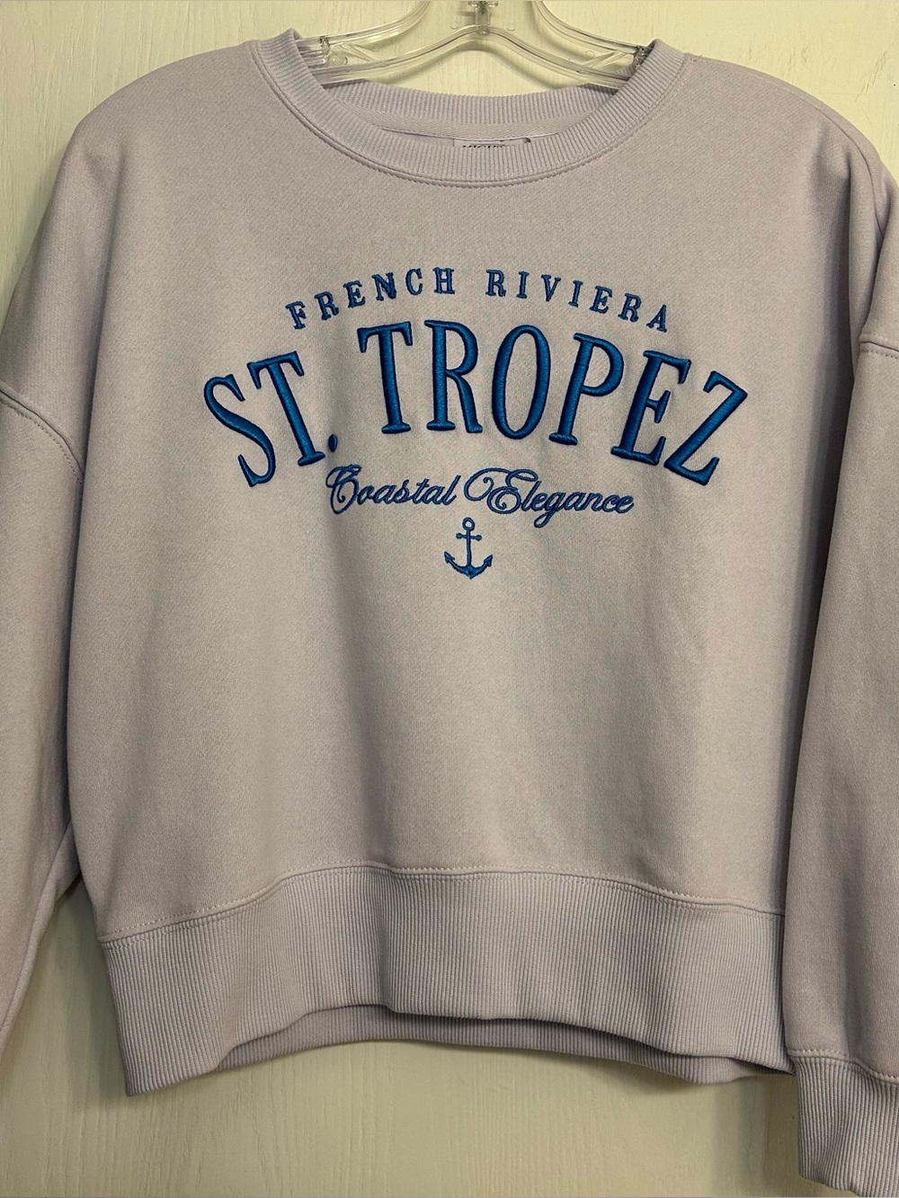 NWOT Mighty Fine Lavender cropped Sweatshirt with Blue St. Tropez graphic. XS